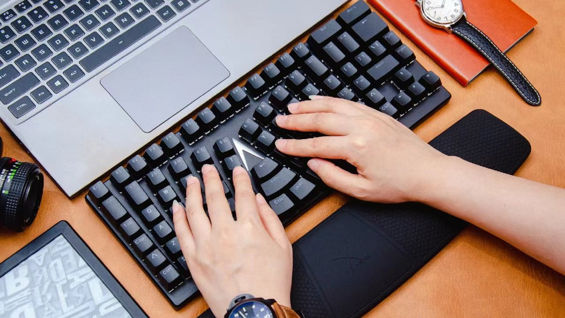 X-Bows ergonomic mechanical keyboard with radial-columnar splay layout showing anatomical alignment for wrist health