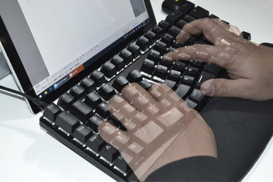 Close-up of typing with a X-BOWS Ergonomic keyboard